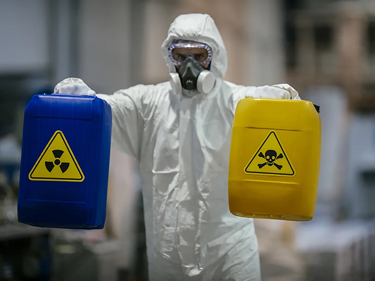 Biohazard cleanup technicians in protective equipment at a remediation scene in Redmond, WA